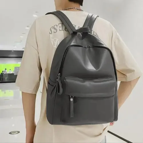 Sleek Black Leather Zip Backpack Bag