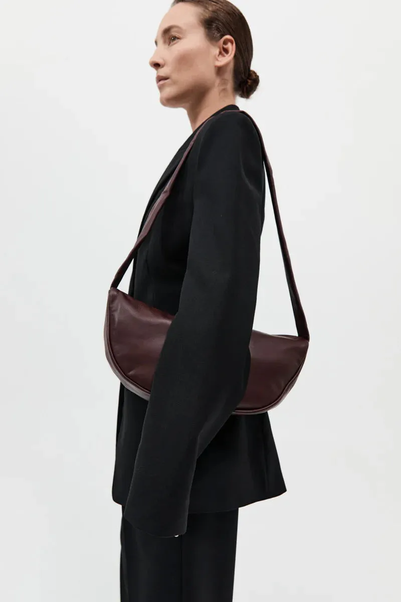 St Agni Soft Crescent Bag in Plum