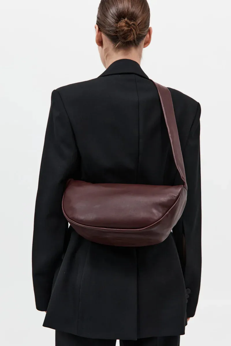 St Agni Soft Crescent Bag in Plum